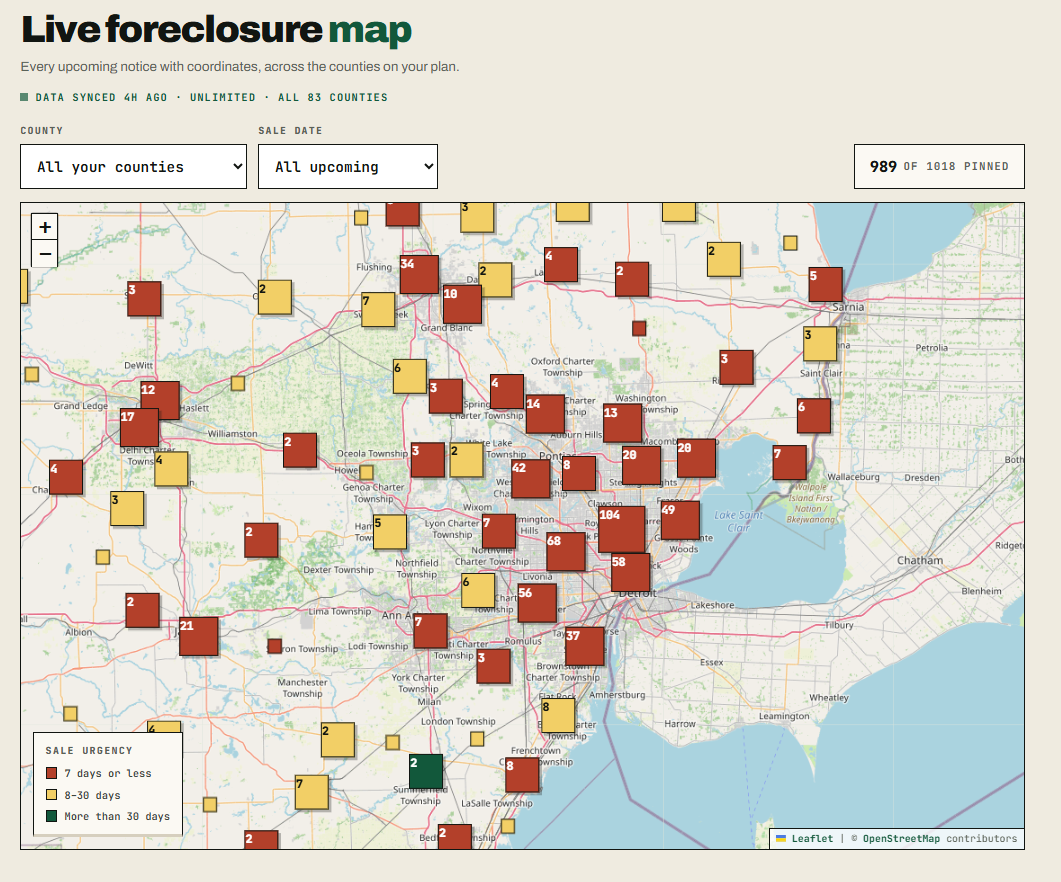 Map of Michigan showing clustered foreclosure auction pins across the state